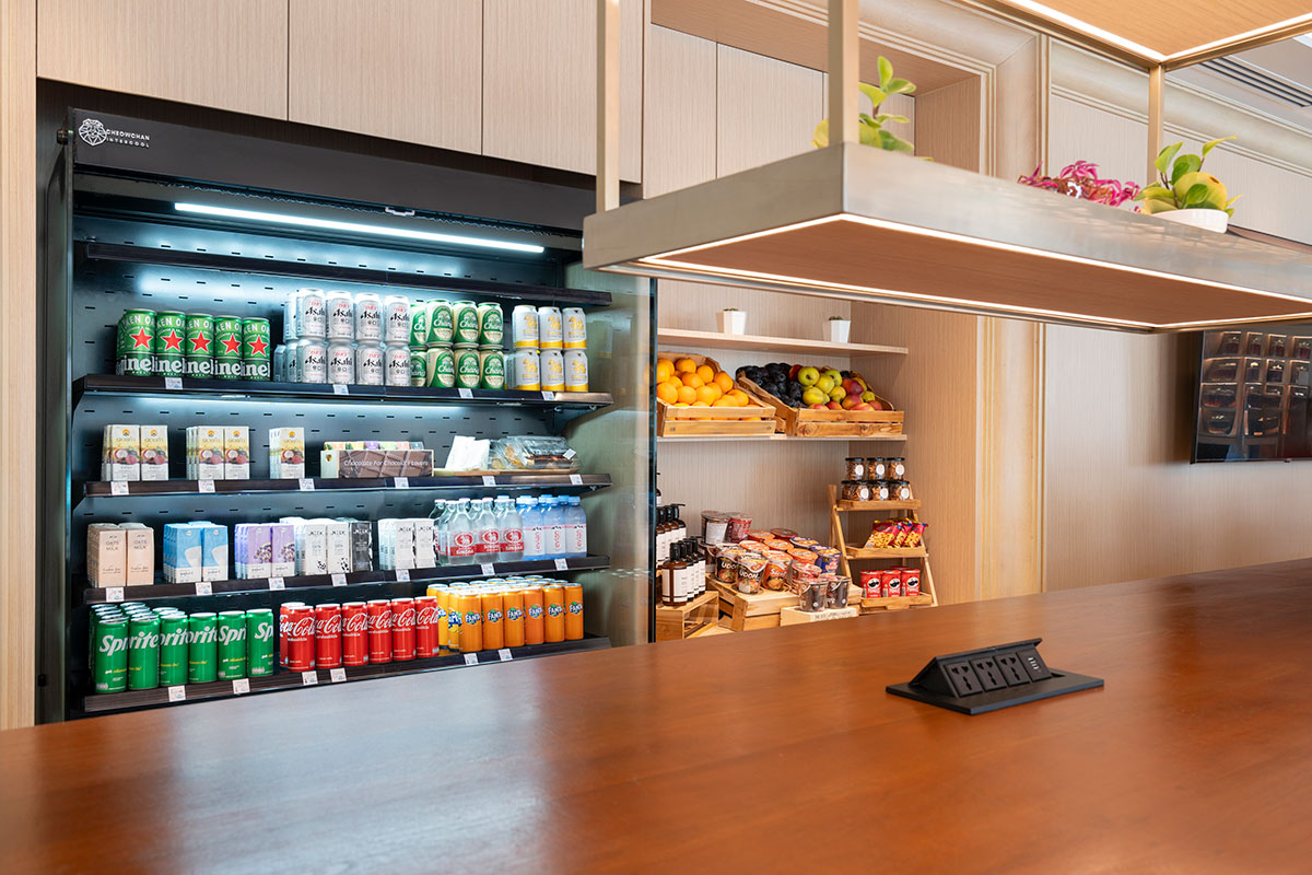 24 hour Grab & Bite grocery at Novotel Living Bangkok Sukhumvit Legacy, offering food and drinks for guests.