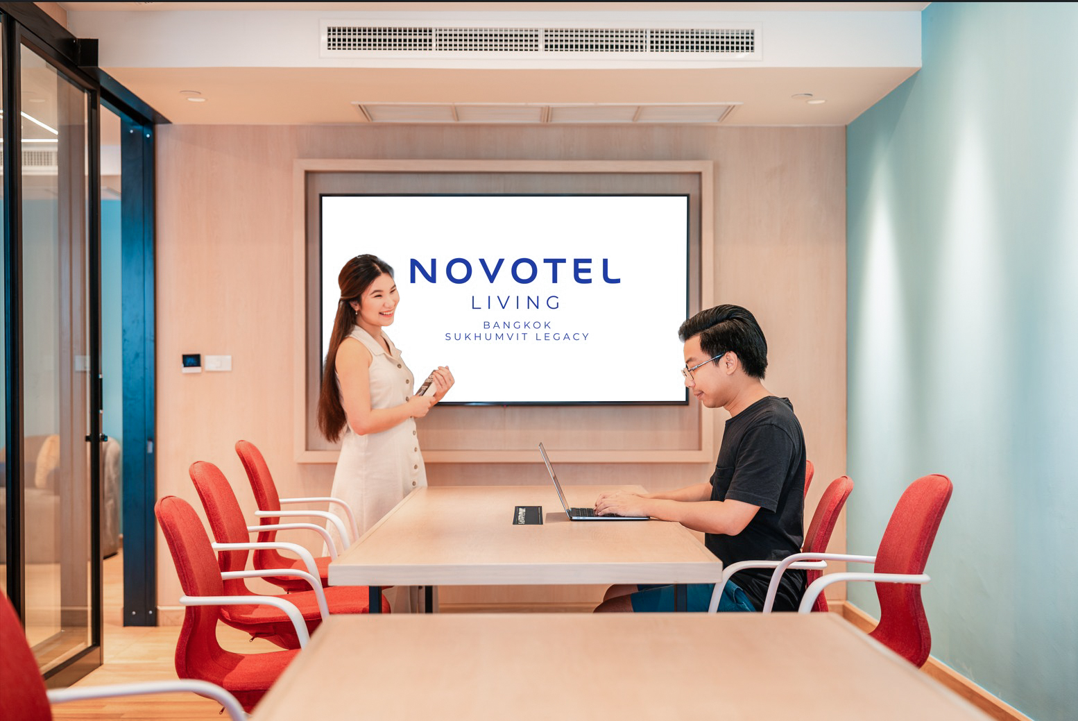 Modern and comfortable working space with high-speed internet and ergonomic seating for business travelers.