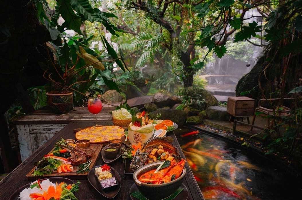 A traditional Thai restaurant with lush greenery and an authentic dining ambiance.